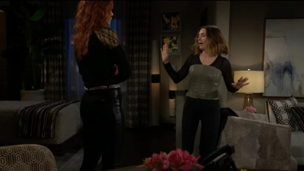 Chloe and Sally talk in the living room of Sally's hotel suite