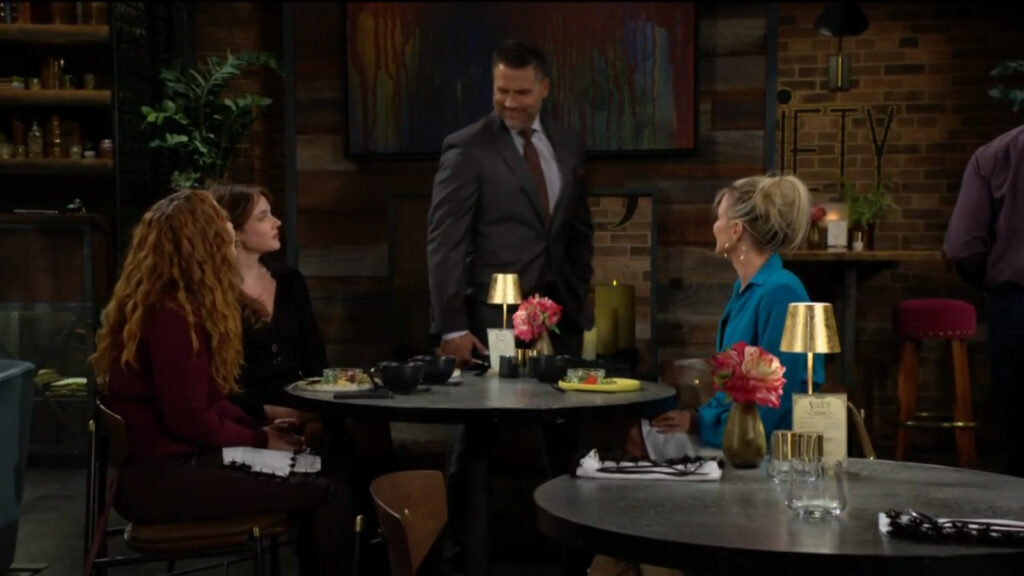 Nick joins Mariah, Tessa, and Sharon at their table