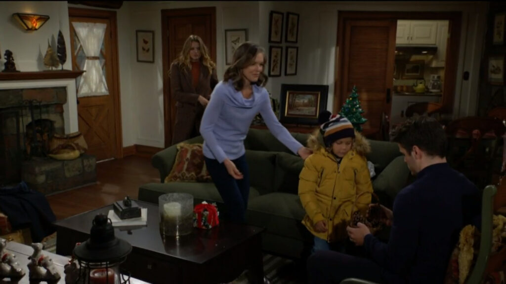 Harrison shows Dee-Dee (Diane) his collection of pinecones while Kyle and Summer look on