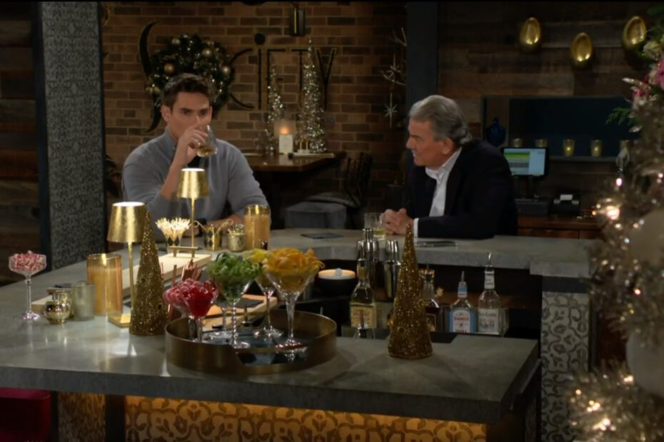 Adam looks troubled as he takes a drink of eggnog at the bar with his father, Victor Newman
