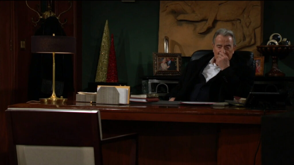 Victor Newman sits at Victoria's desk in her office at Newman Enterprises