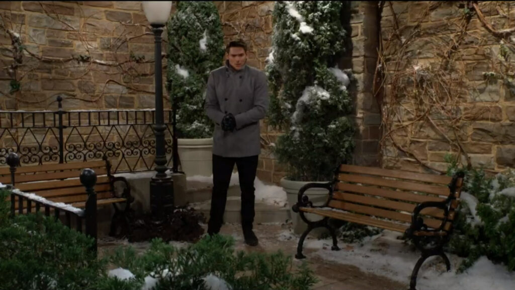Adam stands in a snowy Chancellor Park, thinking about his father