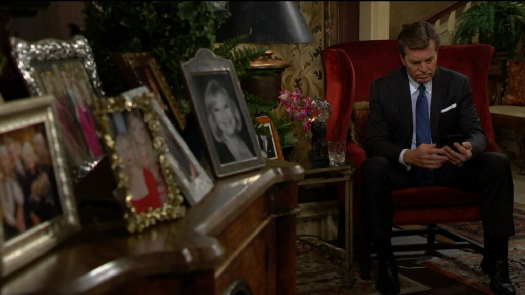 Jack looks at a picture on his phone of Diane and Kyle together - Young and Restless Recap for Dec 9, 2022