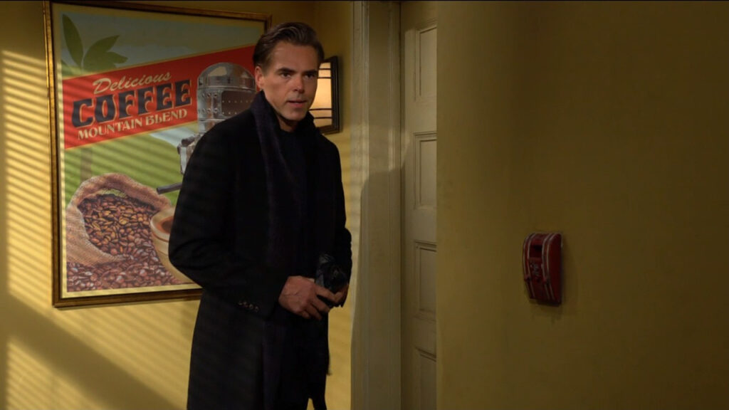 Billy stands outside Chelsea's door