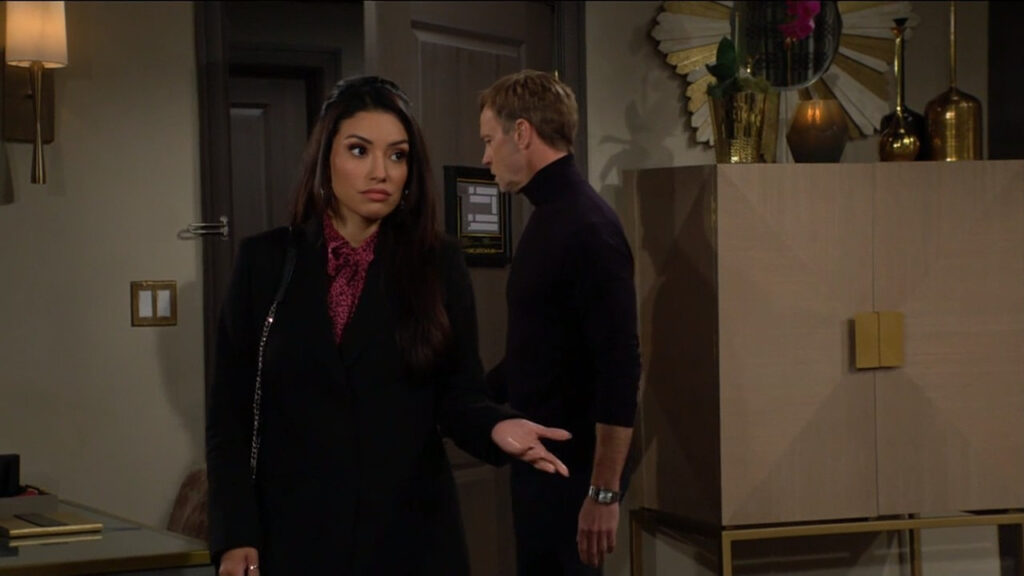Audra holds out her hand in confusion as she walks into Tucker's hotel suite