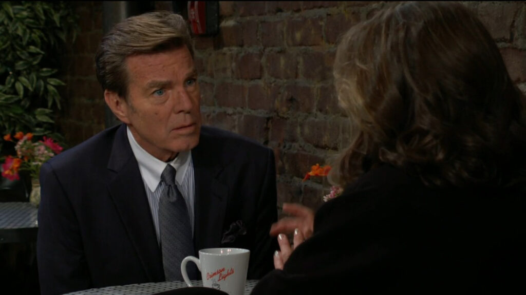 Sitting at a table in Crimson Lights, Jack listens as Diane tells him about her meeting with Jeremy