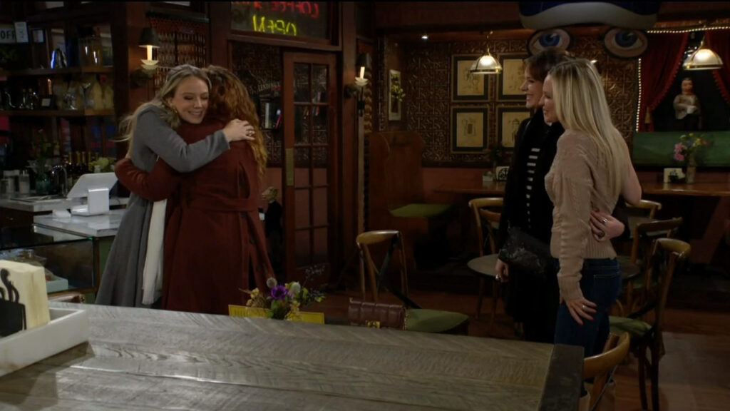 Abby hugs Mariah as Tessa and Sharon look on