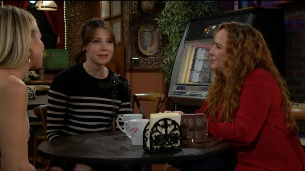 Sharon speaks with Tessa and Mariah as they sit at a table in Crimson Lights