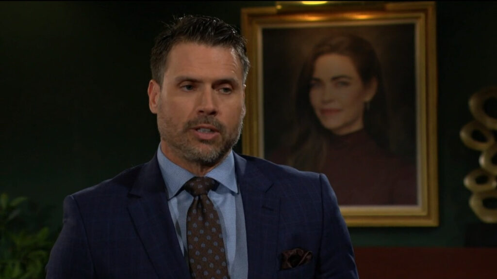 Nick speaks to Victoria while he stands in front of a portrait of her