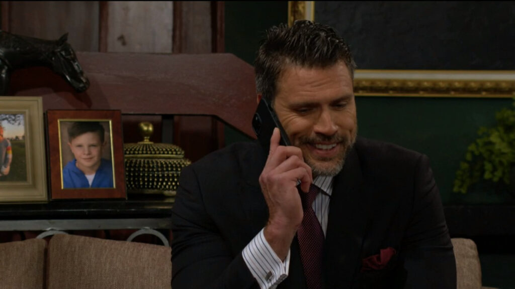 Nick smiles as he talks on the phone with Sally