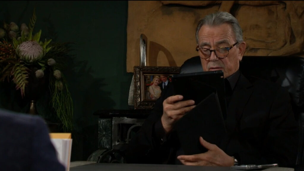 Victor reads over the information that Kyle brought him