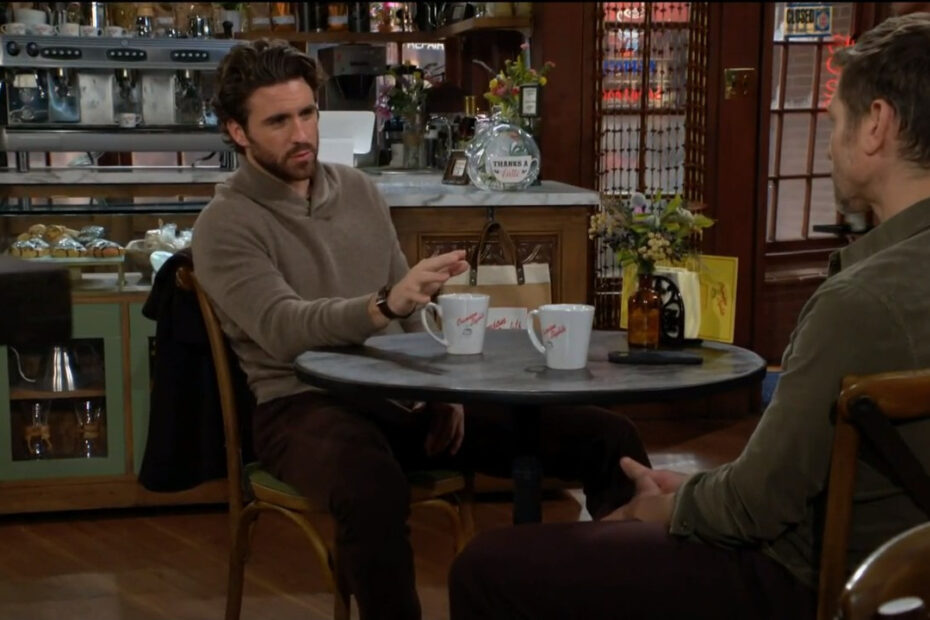 Chance gestures as he talks with Daniel in the coffee shop