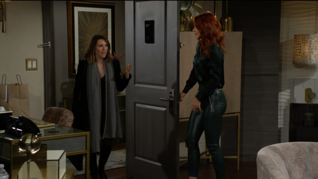 Sally opens the door for Chloe to come into her hotel room