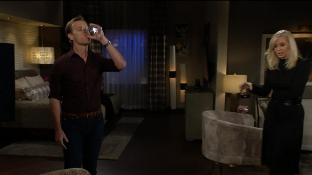 Tucker slams back a drink as he and Ashley talk