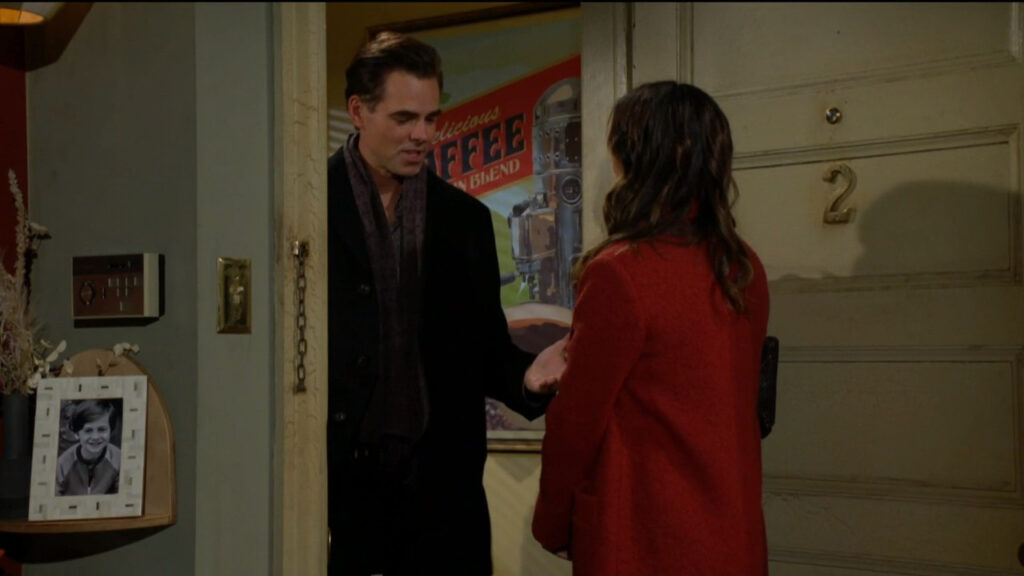 Billy offers Chelsea his hand at her apartment door