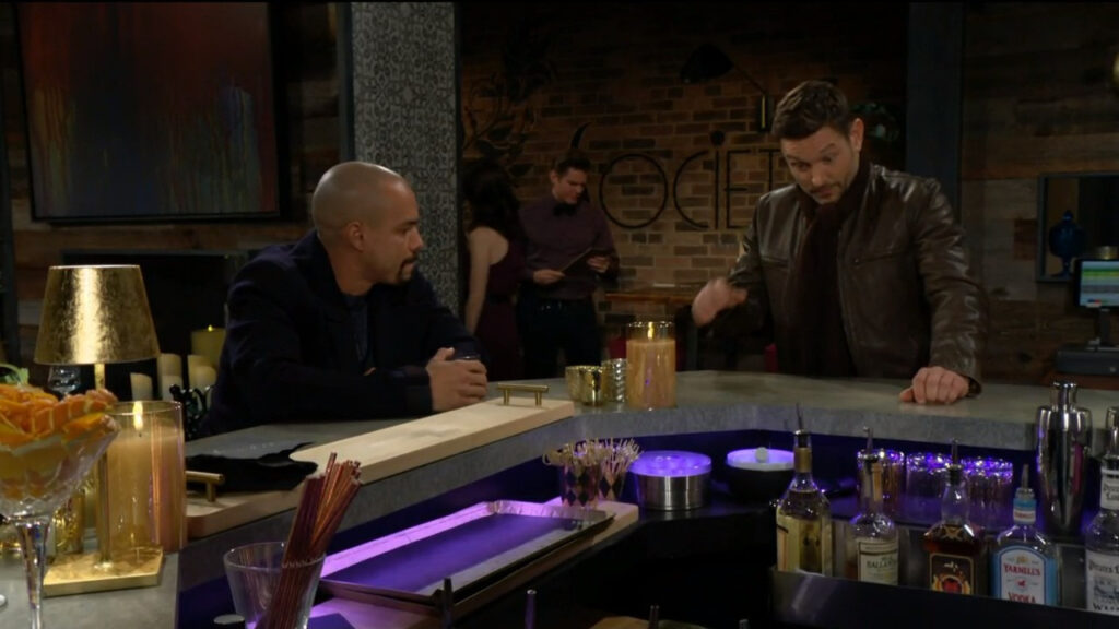 Daniel comes into Society and sits at the bar with Devon