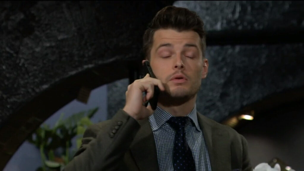 In the Jabot lobby, Kyle talks on the phone with Summer