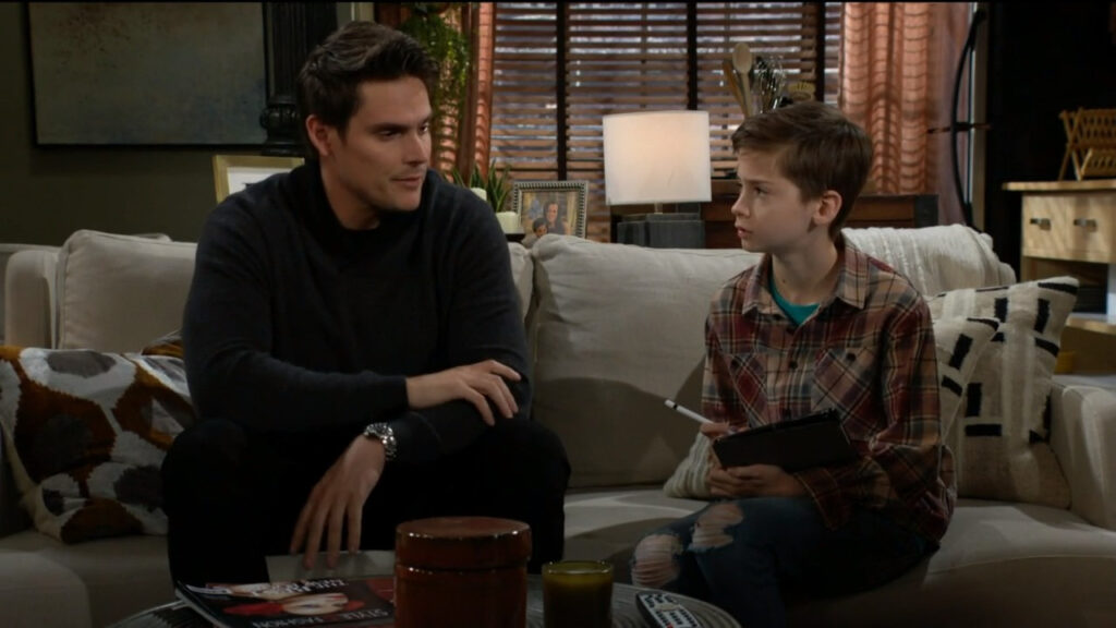 Adam and Connor sit on the couch and talk about the family tree