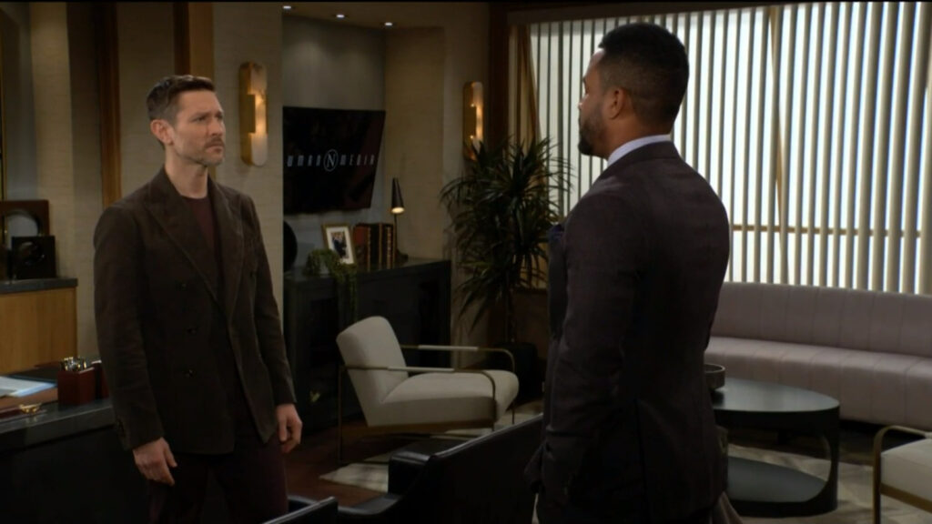 Daniel and Nate talk in Nate's office