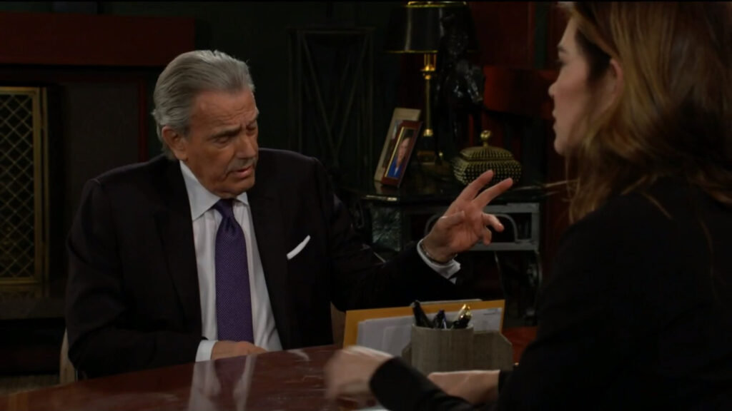 Victor gestures as he talks with Victoria
