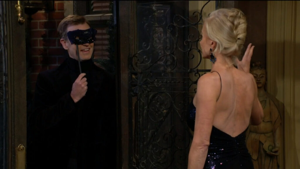 Ashley answers the door to find Tucker there with a mask held up to his face