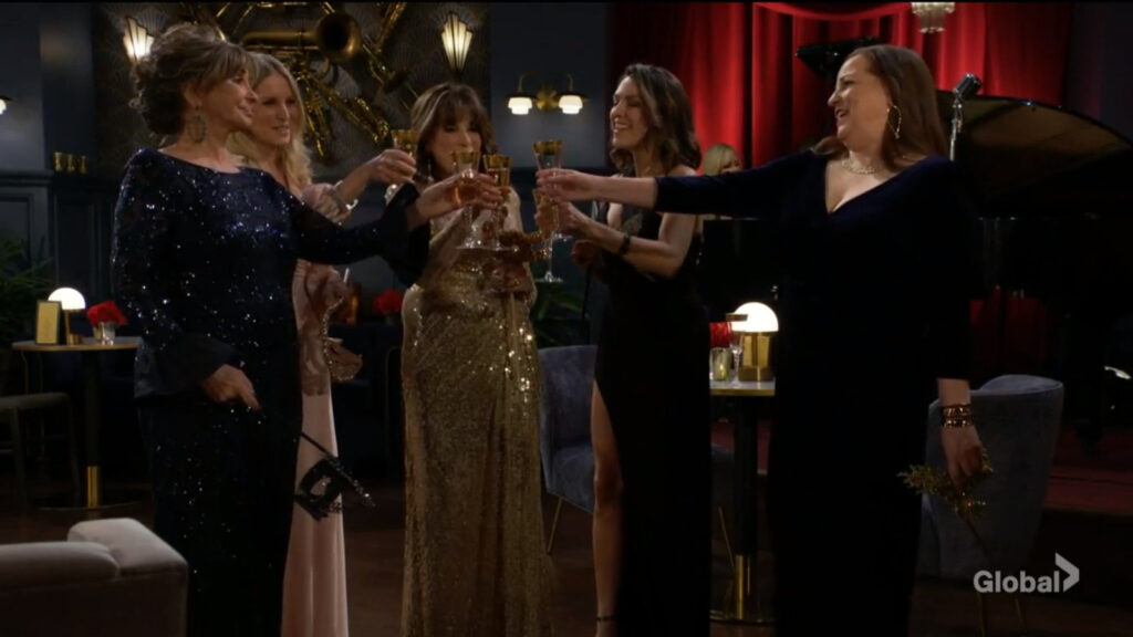 Jill, Christine, Esther, Chloe, and Nina all toast