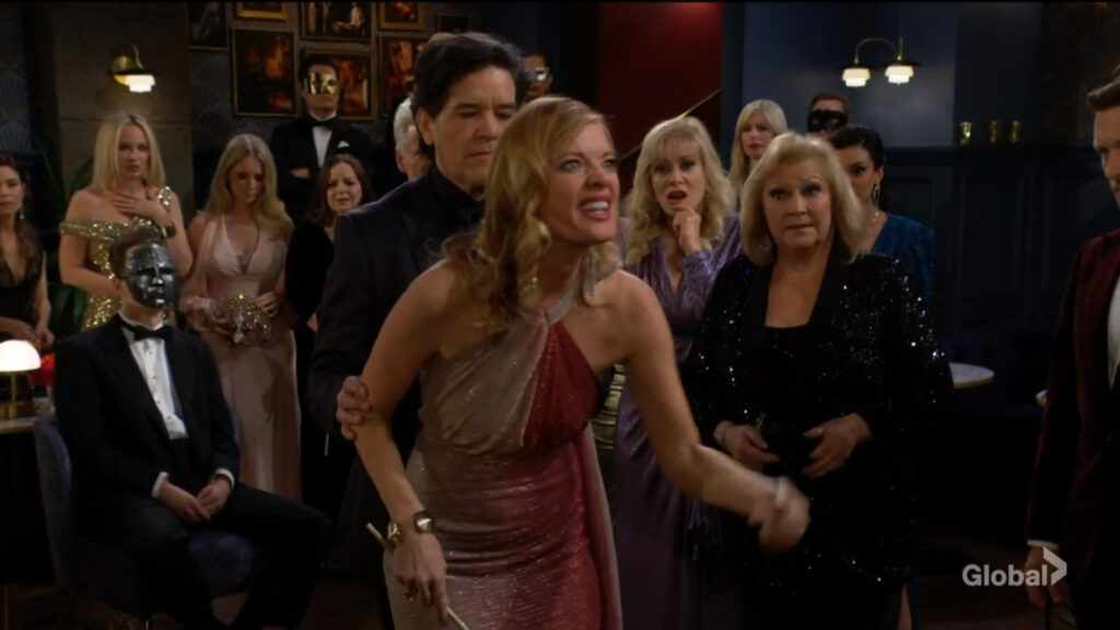 Phyllis yells at Diane while Danny holds her arm