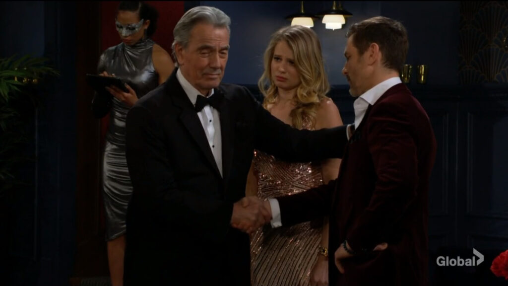 Victor shakes Daniel's hand