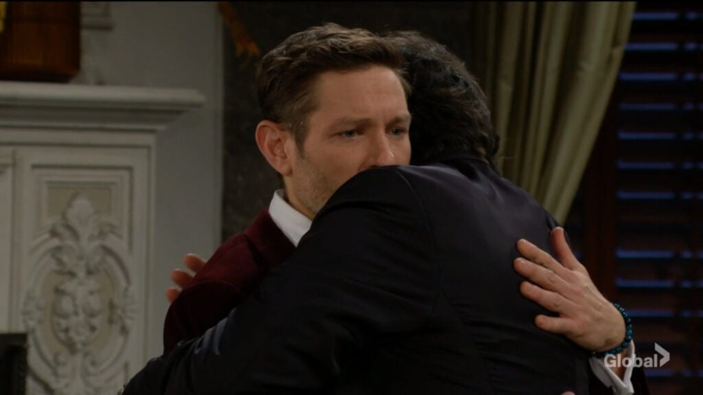 Daniel hugs his father