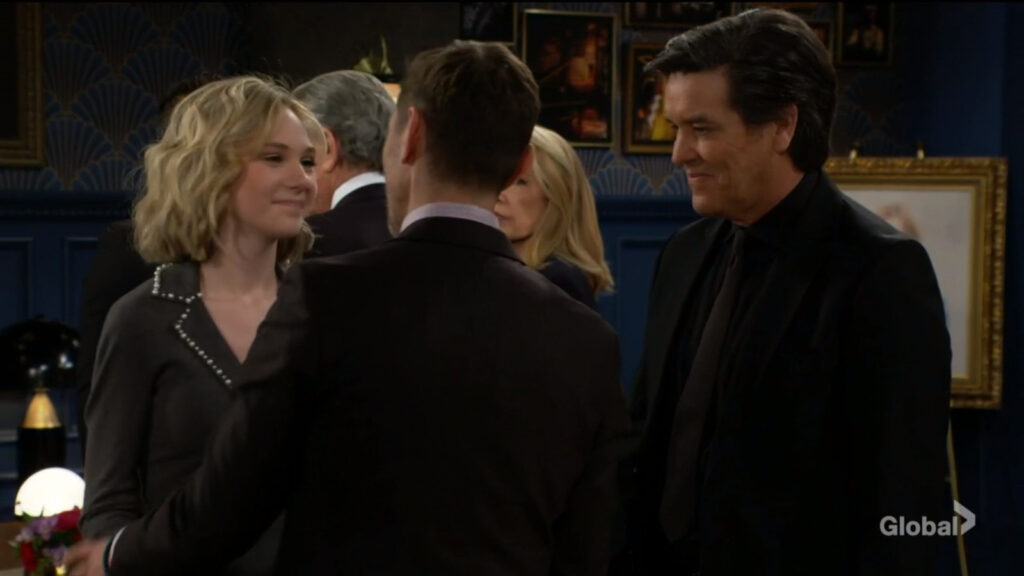 Lucy greets her father, Daniel, as Danny, Nikki, and Victor look on
