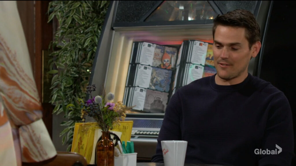 Adam smiles as he talks with Sharon