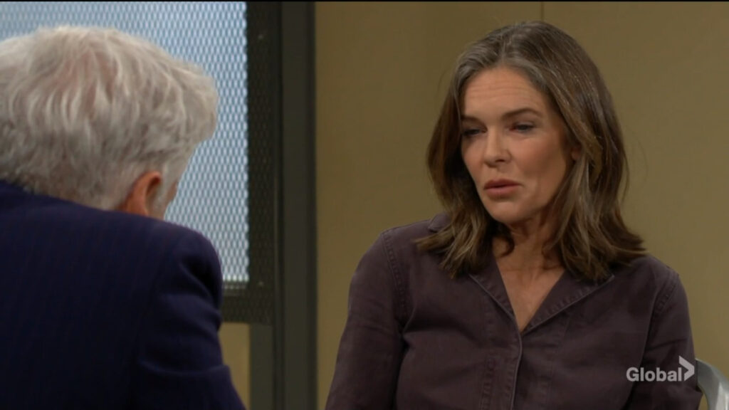 Diane scoffs as she talks with Michael.