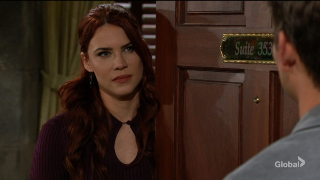 Sally opens the door to find Adam there.