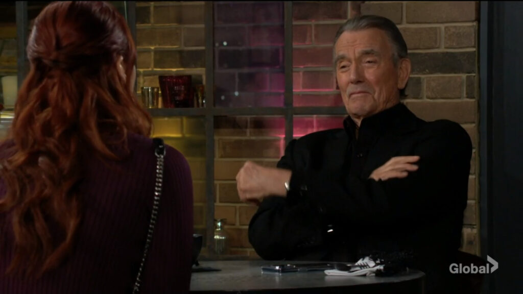 Victor smiles as he talks with Sally.