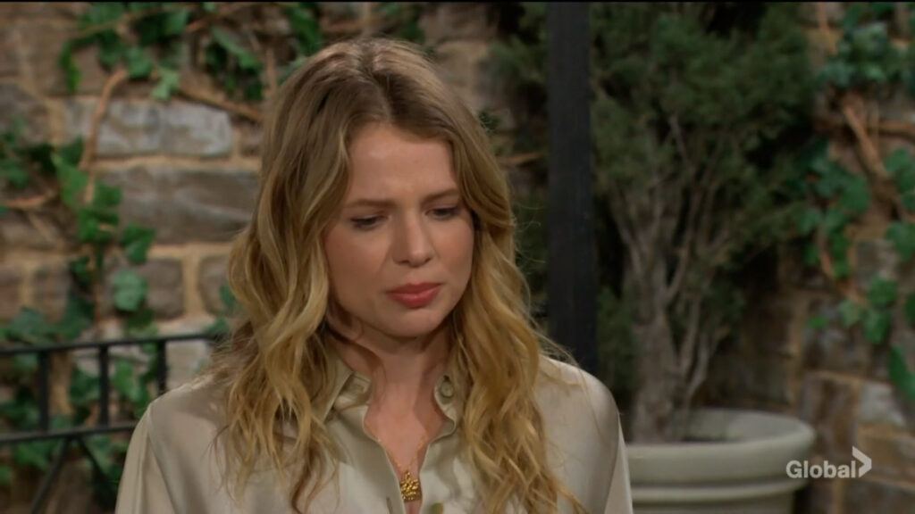 Summer looks sad as she talks with Daniel.
