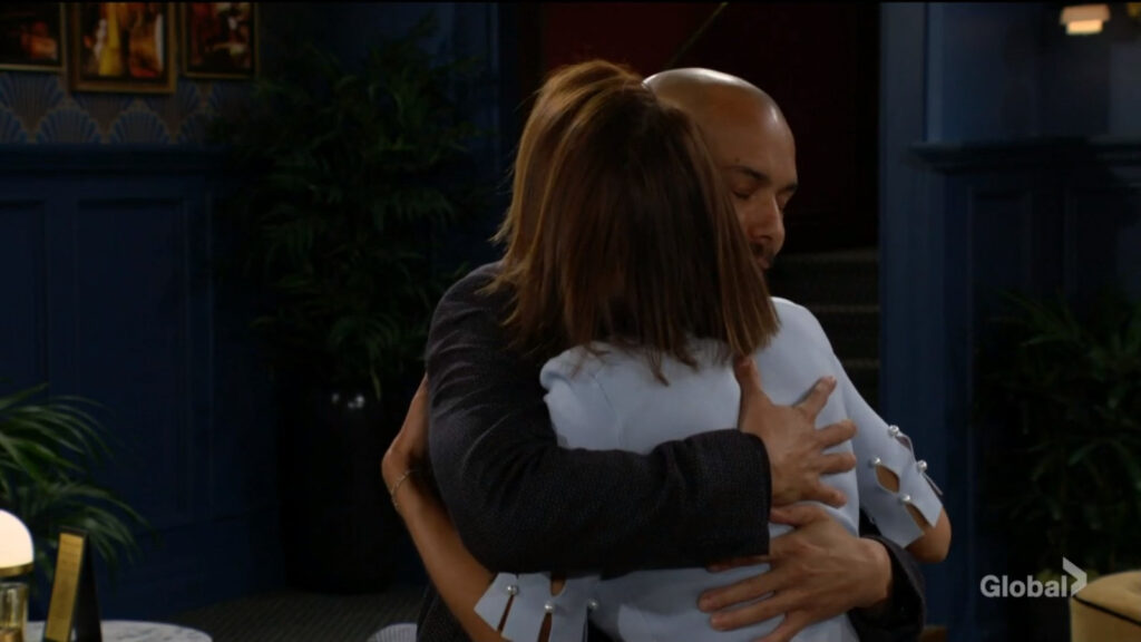 Devon hugs Lily tightly.