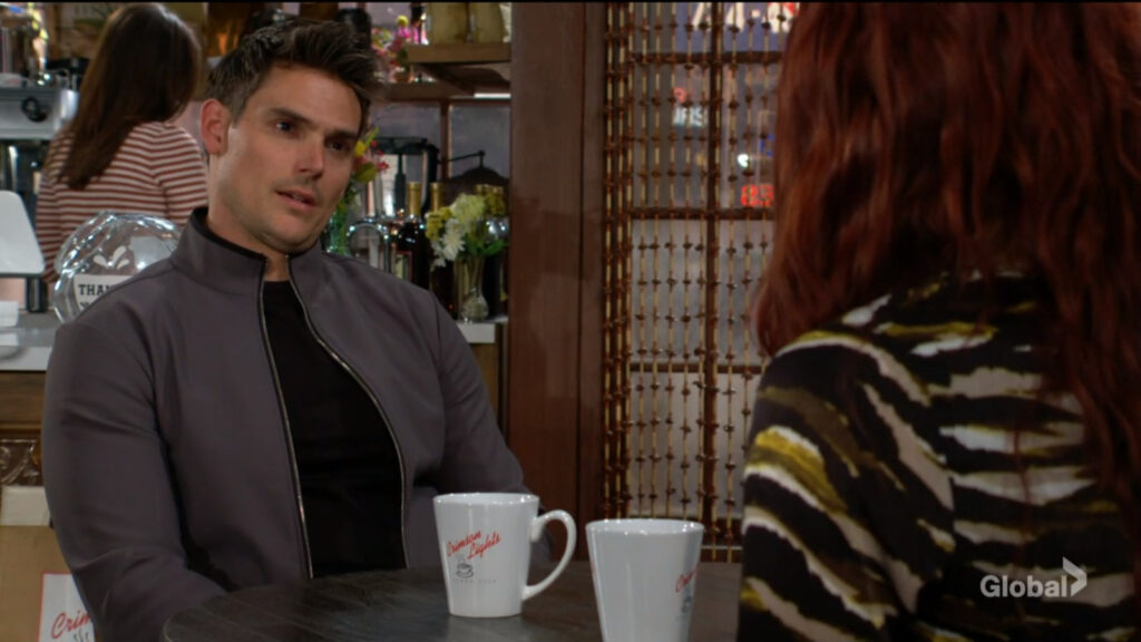 Adam sits and talks with Sally.