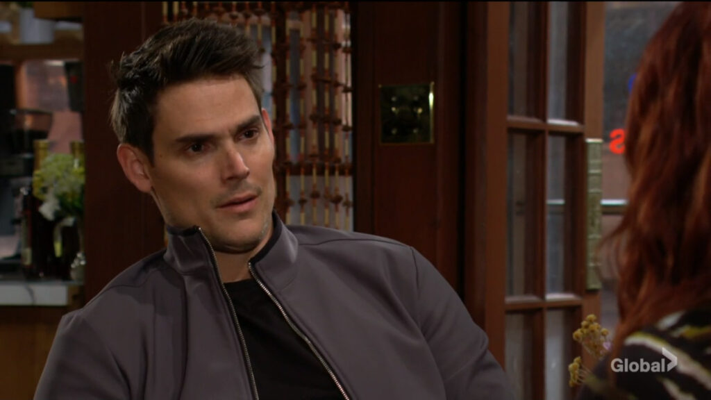 Adam reacts as he talks with Sally.