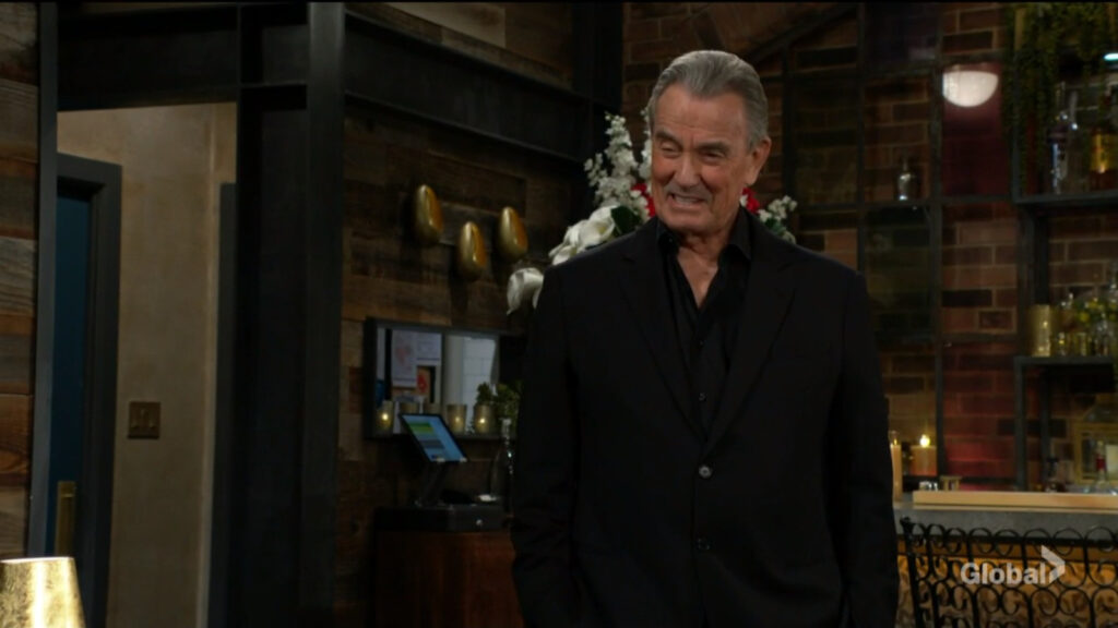 Victor smiles at Jack as he talks with him.