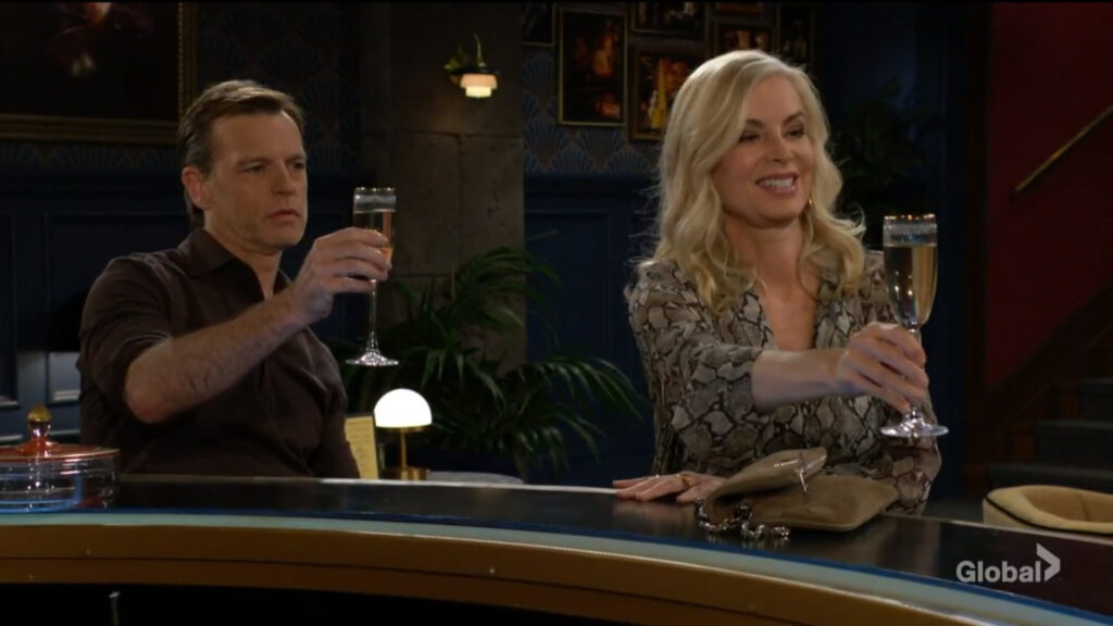 Tucker and Ashley raise their glasses with Devon and Abby in honor of Neil.