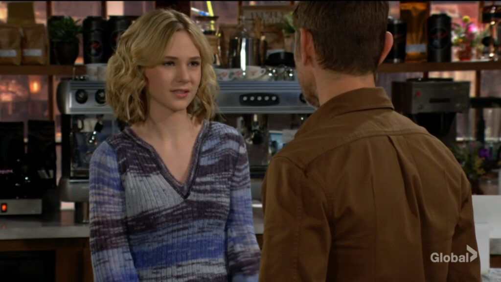 Lucy talks to her dad in the coffee shop.