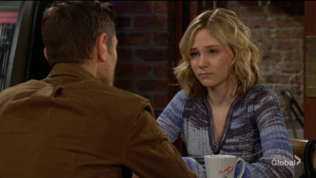Lucy looks sad as she talks with Daniel.