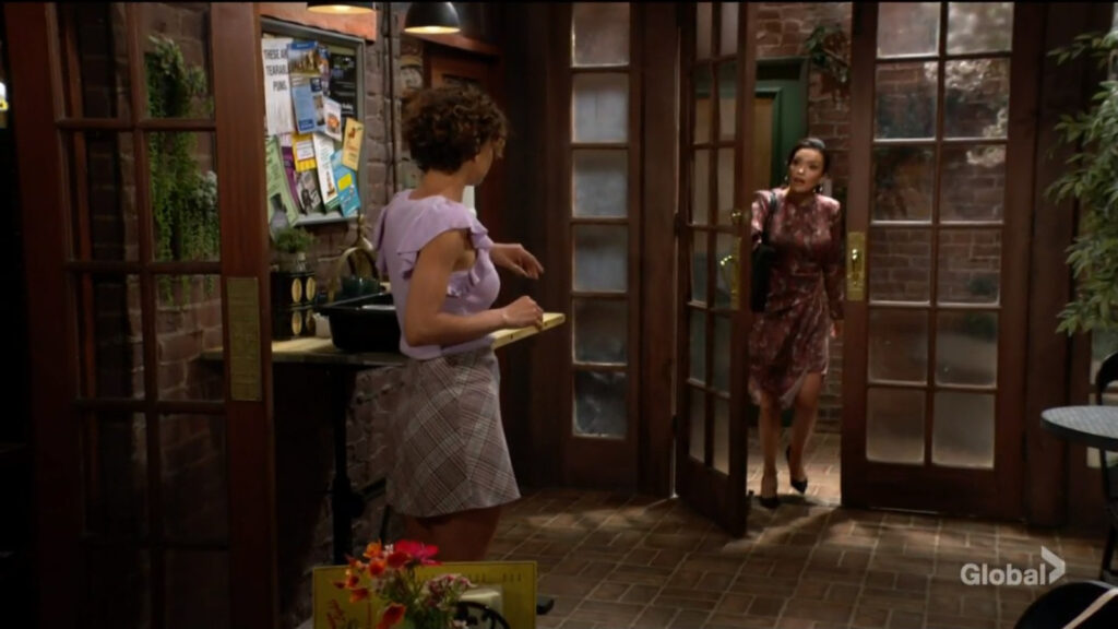 Audra meets Elena in the coffee shop.