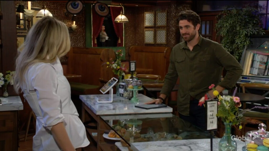 Chance smiles at Sharon as he orders a coffee.