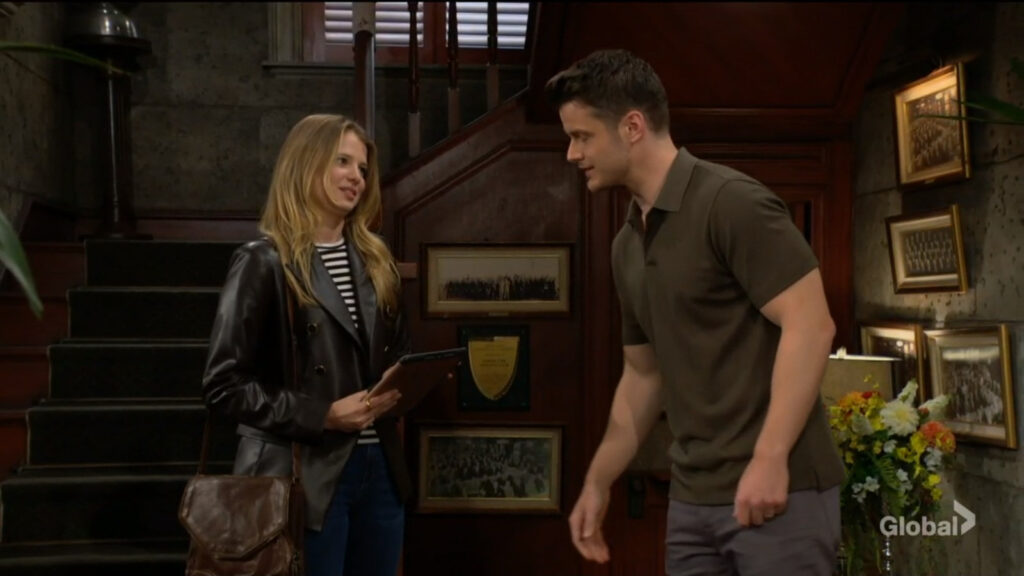 Summer holds her tablet as she talks with Kyle.