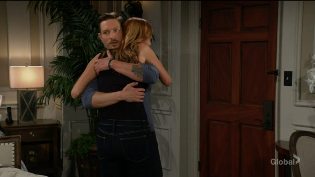 Daniel looks shocked as he hugs Phyllis.