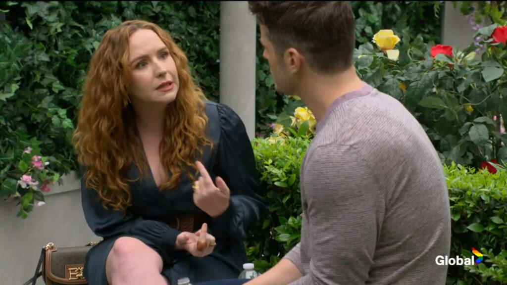 Mariah gestures as she talks with Kyle.