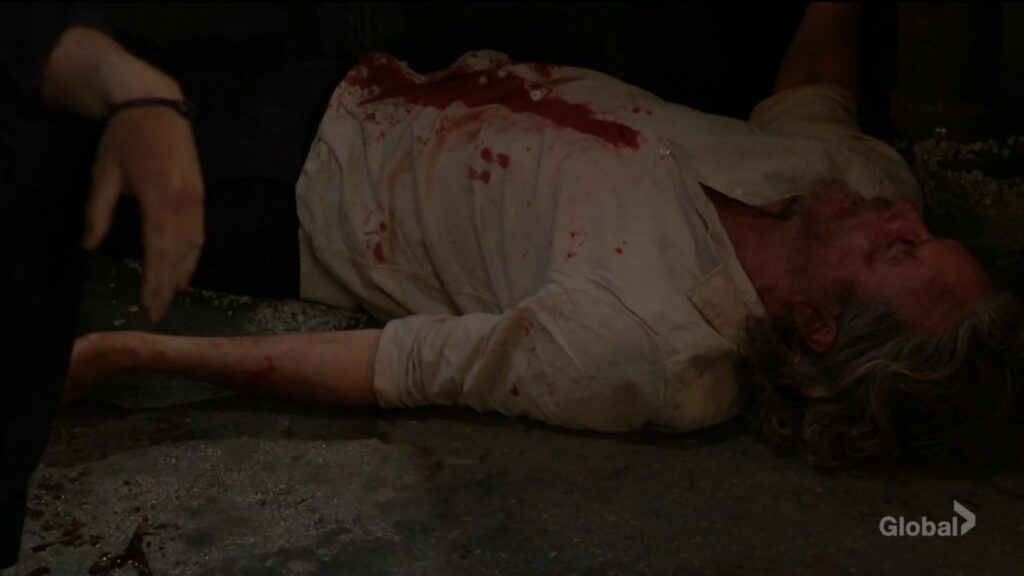 Cameron lies dead on the floor.