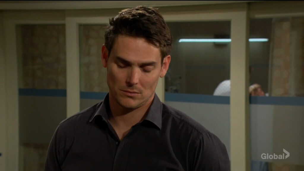 Adam looks sad as he waits outside Sally's hospital room.