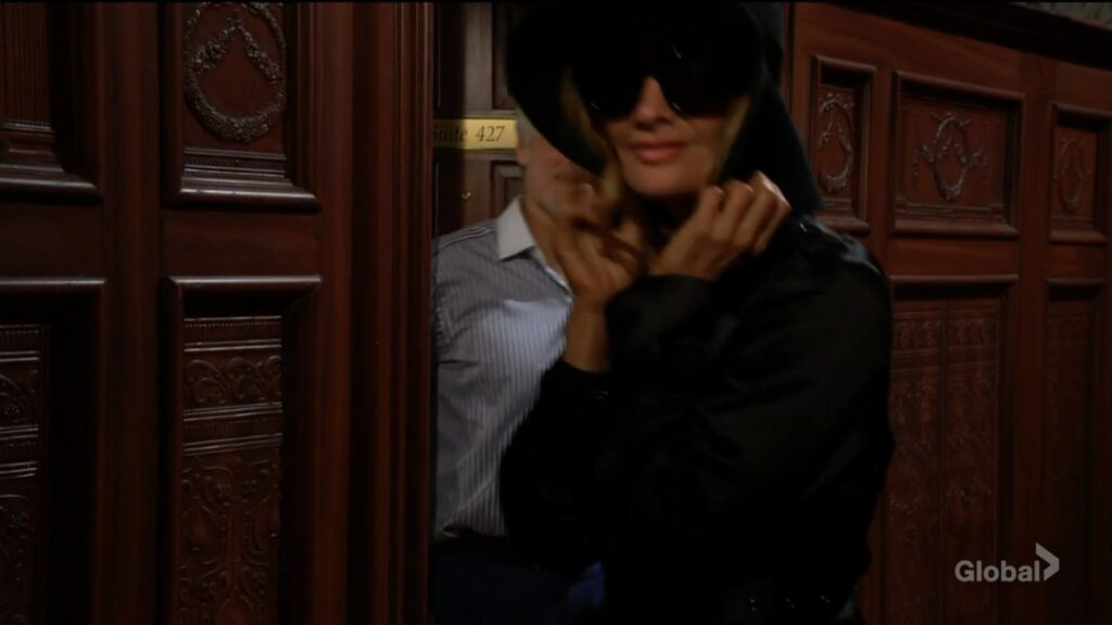 Michael looks after Phyllis as she leaves his hotel room.